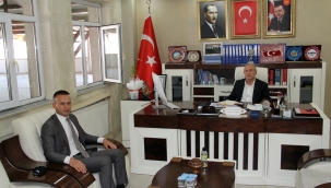 ​​​​​​​ AK Parti Ağrı İl Başkanı Av. Halil Özyolcu'ya  Ağrı Milli Eğitim Müdürü M. Faruk Tekin'in Hayırlı olsun ziyaret